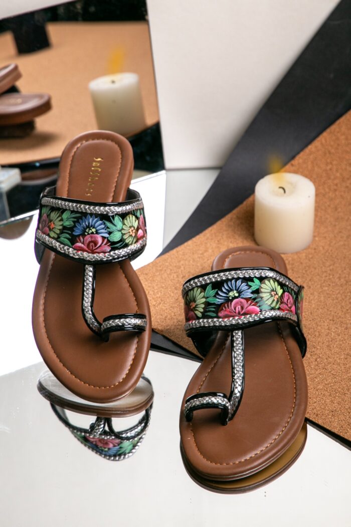 painting kolapuri in black