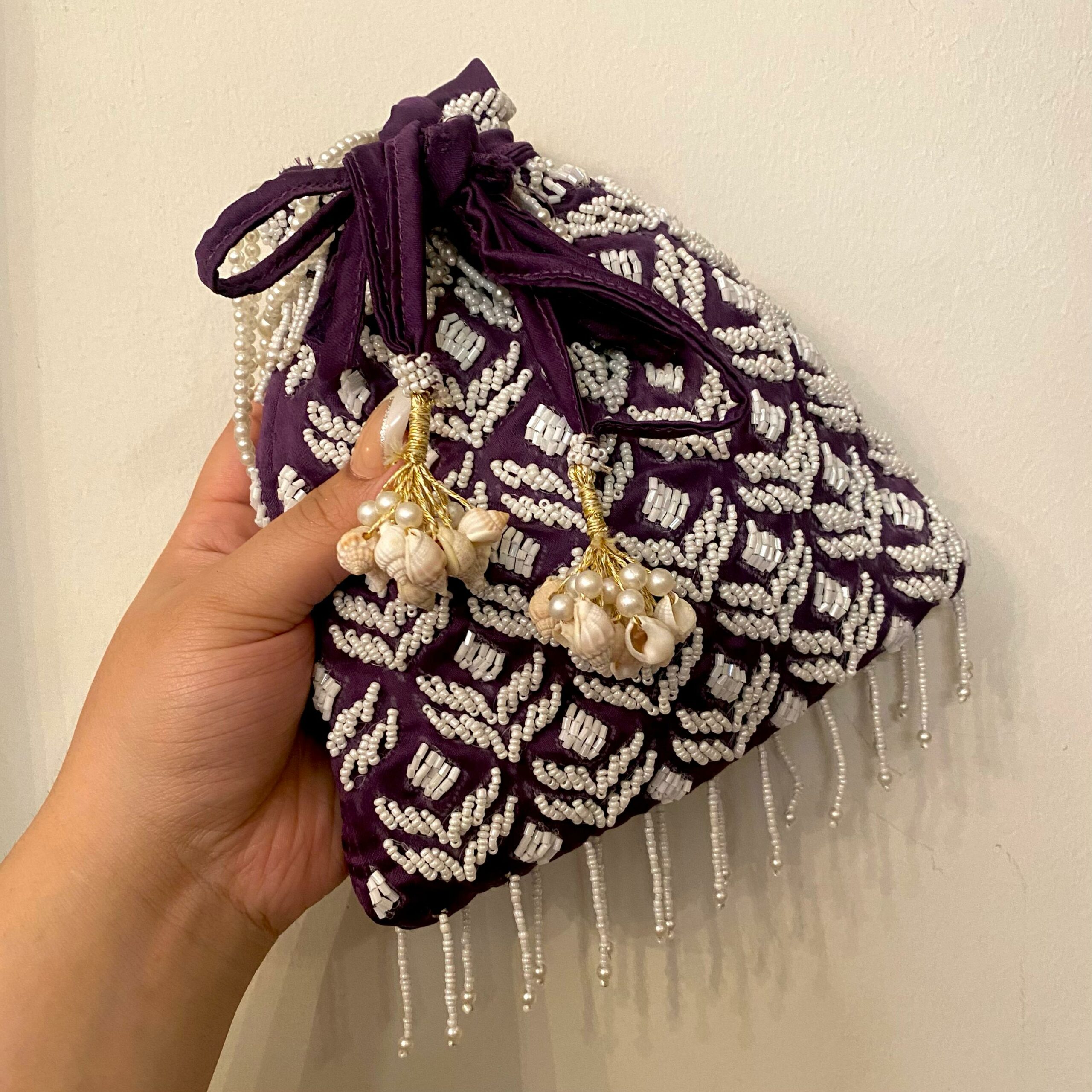 Lilac Potli With White Pearls For Her Lilac Potli With White Pearls For Her