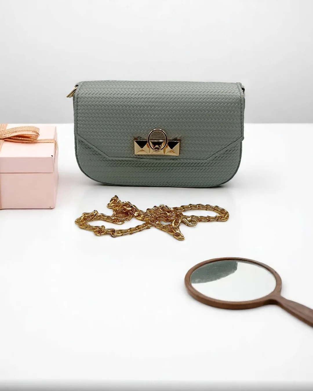 handbag-4-webp The Studded Clasp Chain Bag In Grey - Image 1