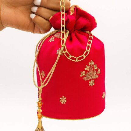 Shocking Pink Potli With Golden Bunch For Her